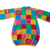 Flat lay of the back of the knit sweater dress with a green collar. The design is bright pink, red, yellow, green, and orange puzzle playmat tiles with some tiles having hearts or stars.