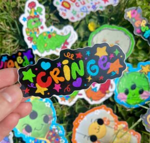 Colorful stickers with various designs on a grass background