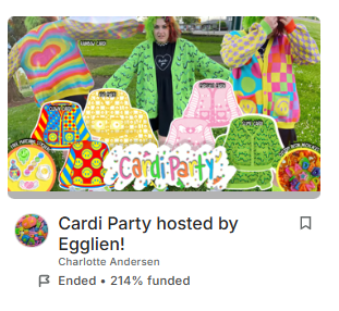 A screenshot of a successful kickstarter campaign. The cover image includes various images of cardigan mock ups and a woman in a slime cardigan and rainbow cardigan. Text below the image reads "Cardi Party Hosted By Egglien!Charlotte Andersen , Ended • 214% funded"