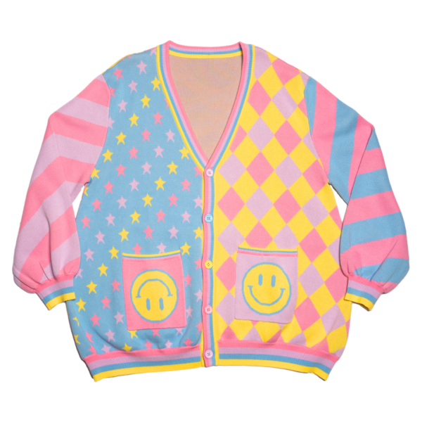 Pastel multicolored cardigan with smiley face pockets on a white background. Cardigan sleeves are alternating color stripes with the front panels being multicolored stars, and a diamond checkered pattern with happy face pockets.