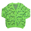 Green cardigan with black and dark green pixel slime pattern laid flat with the front facing the camera.