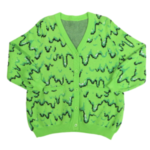 Green cardigan with black and dark green pixel slime pattern laid flat with the front facing the camera.