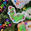 Collection of colorful stickers on a grass background