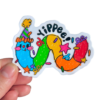hand holding a multi colored worm wearing a party hat with "Yippee" and confetti on top