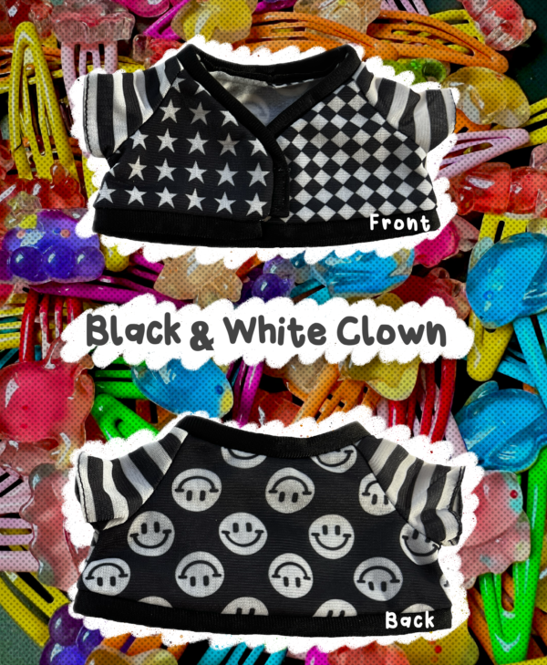 Black & White Clown Cardigan Black and white clown outfit with star and smiley face patterns on a colorful background.
