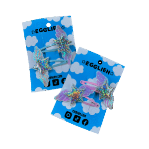 Both Holo star hair clips Two pairs of holographic stars with wings on hairclips both on a blue backing card that reads "Egglien". One pair has pink hair clips and one has blue hair clips.