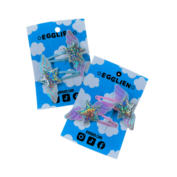 Both Holo star hair clips Two pairs of holographic stars with wings on hairclips both on a blue backing card that reads "Egglien". One pair has pink hair clips and one has blue hair clips.