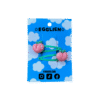 peach hair clip front A pair of peach cabochons on mint hairclips both on blue backing card that reads "Egglien"
