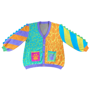 A mismatched colorful animal print cardigan laying flat on a clear background.